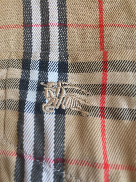 replica mens burberry clothing|authentic burberry polo labels.